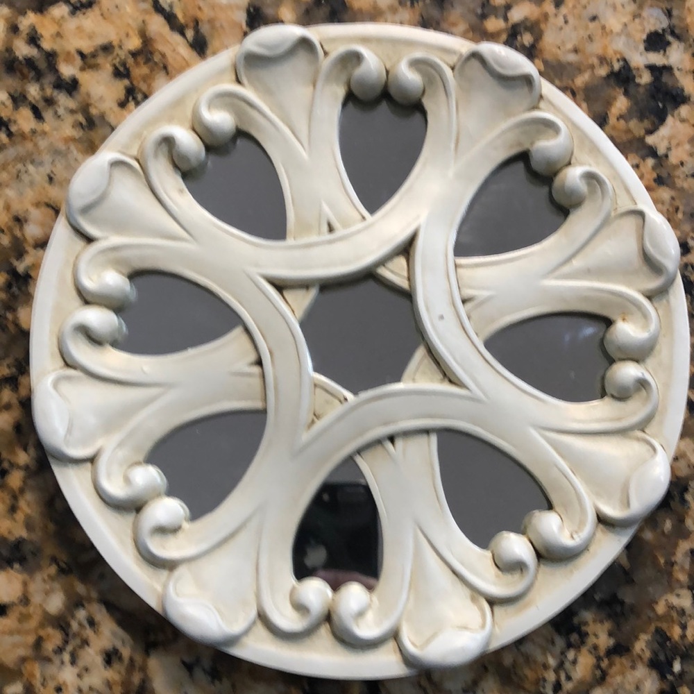 Mirror with removable back